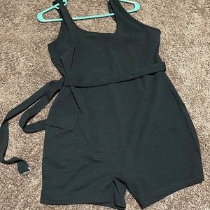 Black romper runs small